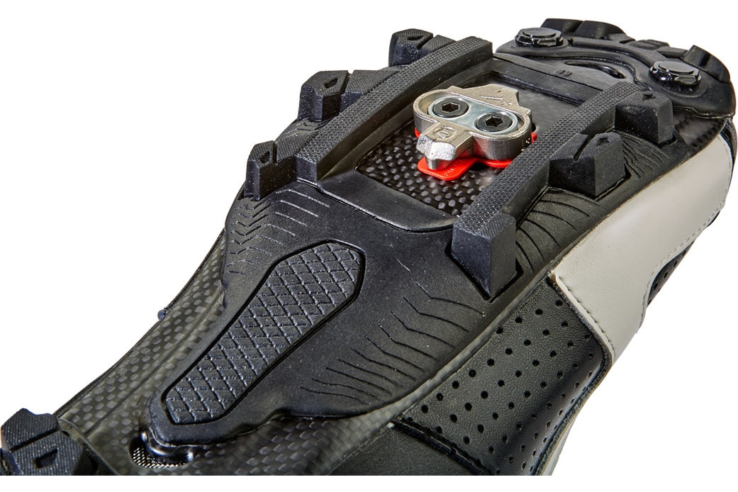 BikeFit Cleat Wedge shown mounted on a cycling shoe under cleat